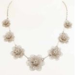 Silver choker, 800/000, with 7 flowers in size made from filigree. length 46 cm, flowers 14-24 mm.