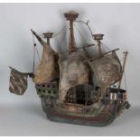 Antique wooden galleon with guns and leather sails. Circa 1900. Size: 58 x 60 x 20 cm. In reasonable