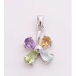 Silver pendant, 925/000, with colored stones. Silver rhodium finish pendant in a flower shape set