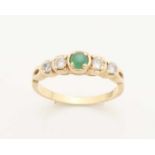 Yellow gold ring, 585/000, with emerald and zirconia's. Rising row ring with 4 zirconia's and a