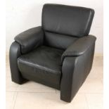 Modern black-leather armrest relax chair. Size: 90 x 80 x 90 cm. In good condition. Moderner