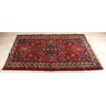 Hand-knotted Persian carpet. Color: Red. Size: 210 x 134 cm. In good condition. Handgeknüpfter