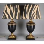 Two stylish brass table lamps. Two-color patinated. Second half of the 20th century. Size: H 58