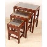 Three-piece Chinese wood-stained red-lacquered mini set with wood-stained tableaux under glass tops.