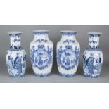 Four-piece old Delft porcelain set. Two with Chinese figures, two with windmill landscapes. 20th