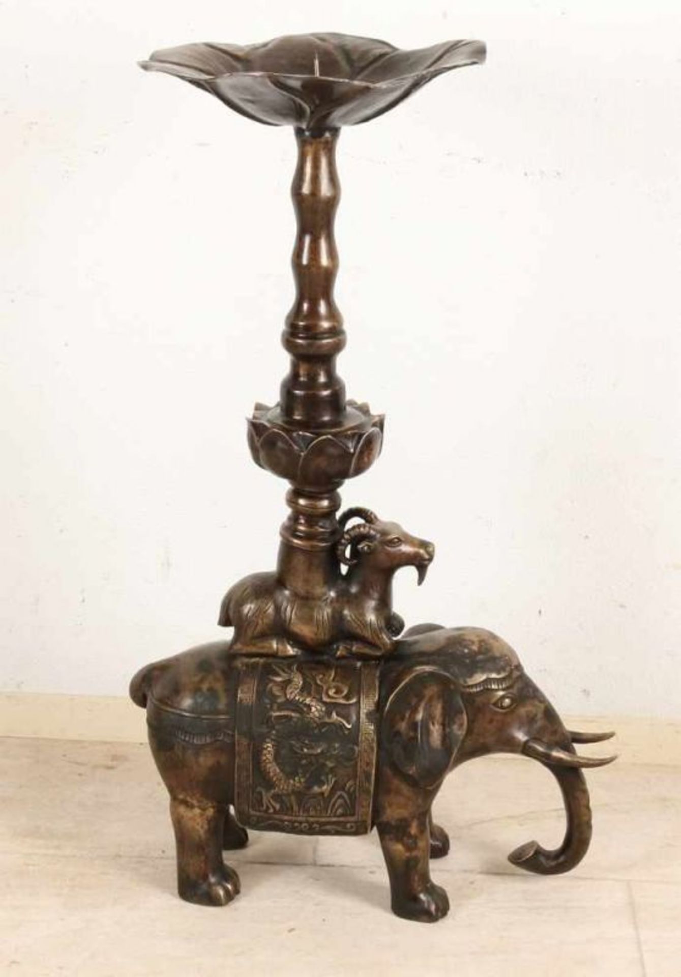 Large Chinese bronze candle candlestick with elephant and lotus flower. 21st century. Size: 90 x