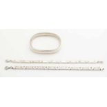 Three silver bracelets, 925/000, a silver link chain decorated with mother-of-pearl, 5 mm, a