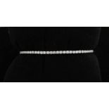 White gold bracelet, 585/000, with diamonds. White gold tennis bracelet with approx. 67 brilliant