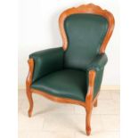 Baroque armchair with green skai. Recently new upholstered. Crown with carving. Chair is from the