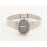 White gold Seiko watch, 750/000, mechanical, with oval case with a bezel with brilliant cut