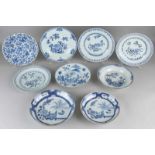 Nine times 18th century Chinese porcelain plates, diverse. One garden decor, blue / white, chip. Two