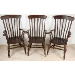 Three English Windsor armchairs made of beech wood. Second half of the 20th century. Good quality.