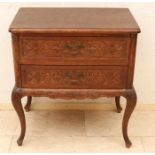 German oak chest of drawers with carving and two drawers. With Queen Ann legs. Mid 20th century.