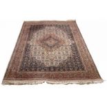 Large Indian hand-knotted rug with floral decors. Osmana Bez. Size: 169 x 243 cm. In good condition.