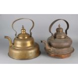 Two 19th century Dutch Biedermeier brass kettles. Dimensions: ø 24 - ø 26 cm. In good condition.