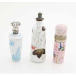 Three porcelain odeo vials, a cylindrical with birds, with a rim, a pear-shaped vial with flower