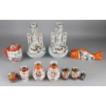 Eleven times antique Japanese porcelain. Consisting of: Kutani carp, Kutani teapot (lid chips),