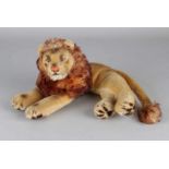 German Steiff lion with 'Knopf im Ohr'. Mohair with glass eyes. Size: 33 cm. In good condition.