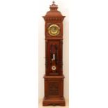 Antique German walnut LFS historicism clock with half-filled columns and roof. With quarter-hour