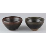 Two old Chinese brown glazed porcelain bowls. Size: 6.7 x 12.3 cm ø and 7 x 12.5 cm ø. In good