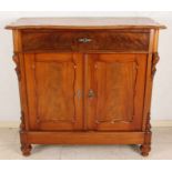 Dutch mahogany Biedermeier penzen cabinet with carving on the beaks, sides with tear, otherwise