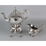 Silver tea can on comforter and creamer. 833/000, Tea can and cream can be richly decorated with