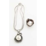 Silver ring and pendant, 925/000, with pearl. Pendant rounded with machining in the middle set