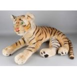 Big old German Steiff tiger, with Knopf im Ohr. Circa 1930 - 1950. Glass eyes, stitched nose.