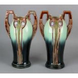 Two antique Jugendstil vases with floral decors. One vase of ear damaged. Size: 30 x 16 x 10 cm ø.