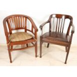 Two office chairs. One time oak with leather seat. Around 1920. Size: 86 x 62 x 53 cm. And one