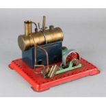 Old tin steam engine with copper kettle. Possibly Meccano. 20th century. Size: 14 x 20 x 18 cm. In