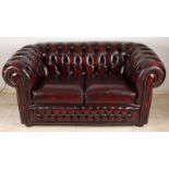 Old brown leather 2-seater Chesterfield sofa. Second half of the 20th century. Size: 74 x 160 x 80