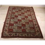 Old Persian rug. Figurative deco. Floral and abstract. Size: 140 x 207 cm. In good condition.