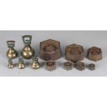 Two sets of 19th century weights. English. From iron and brass. Size: 4 - 10 cm. In good