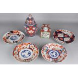 Six times antique Japanese Imari porcelain. 19th century. One tea caddy, good. One cover vase,