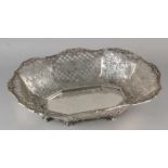 Large silver basket, 835/000, rectangular-shaped model with sawn floral and grid pattern, placed