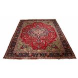 Nice big Persian rug in the colors red, blue and so on. Size: 205 x 282 cm. In good condition.