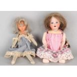 Two antique dolls Germany. One porcelain Heubach Koppelsdorf 300/10, with real hair + paper maché