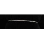 White gold bracelet, 585/000, with diamonds. White gold tennis bracelet with approx. 85 brilliant