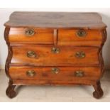 Dutch 18th century double bent elm wood Baroque chest of drawers with brass fittings. Louis