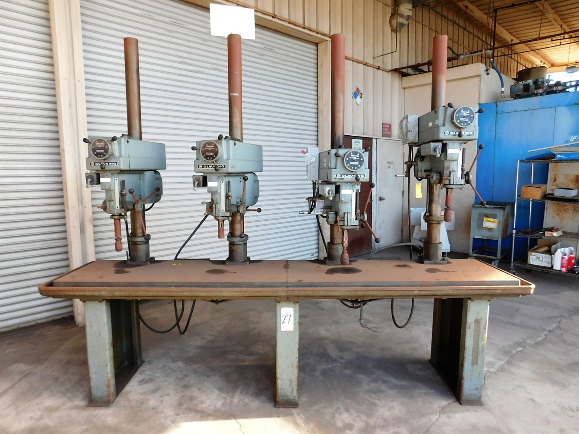 CLAUSING 4-HEAD DRILL PRESS BENCH, W/ (4) MODEL 2286 20" VARIABLE SPEED DRILL PRESSES, WORKTOP