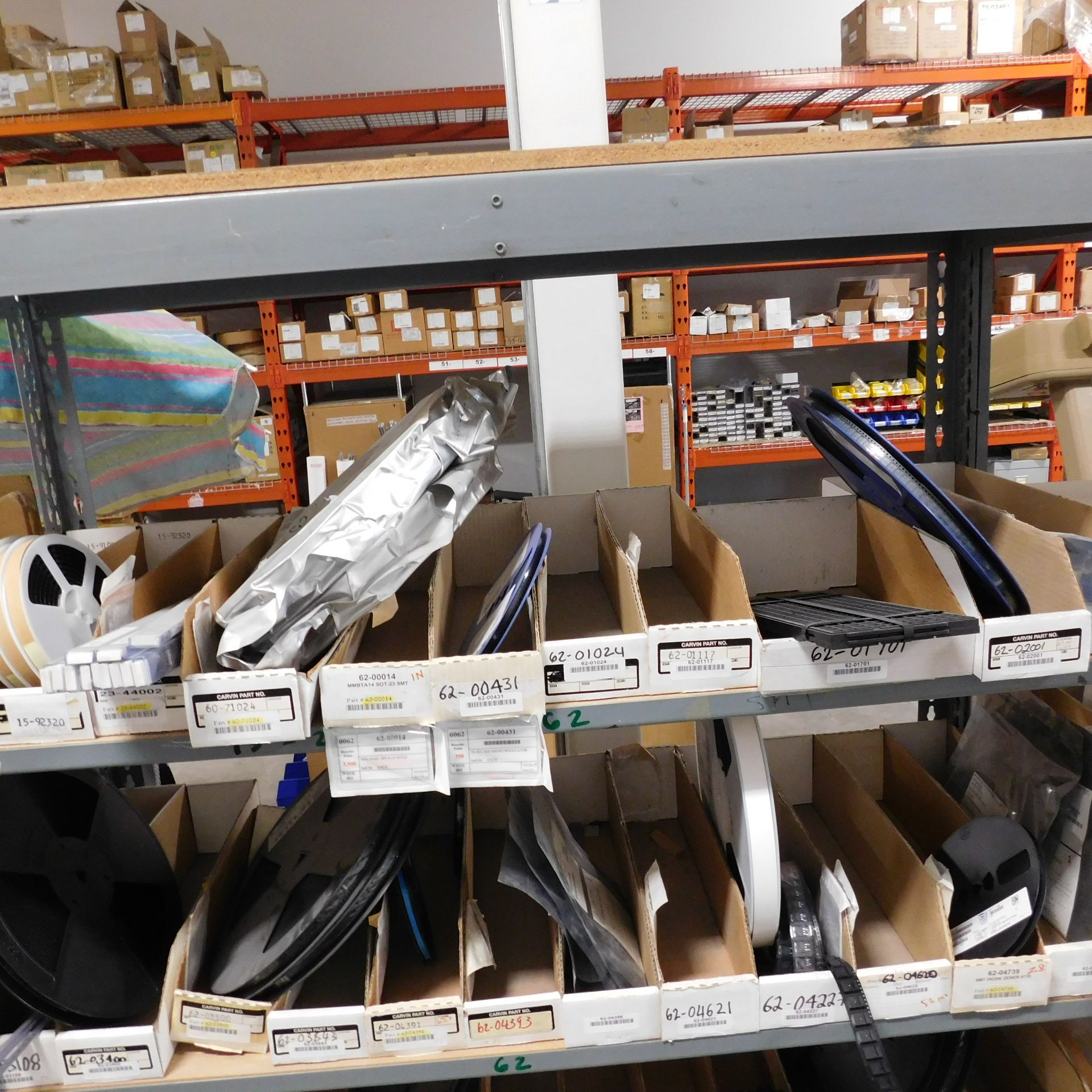 LOT - SHELF UNIT 4' X 18" X 7' W/ ASSORTMENT OF ELECTRONIC COMPONENT FEEDER ROLLS - Image 2 of 3