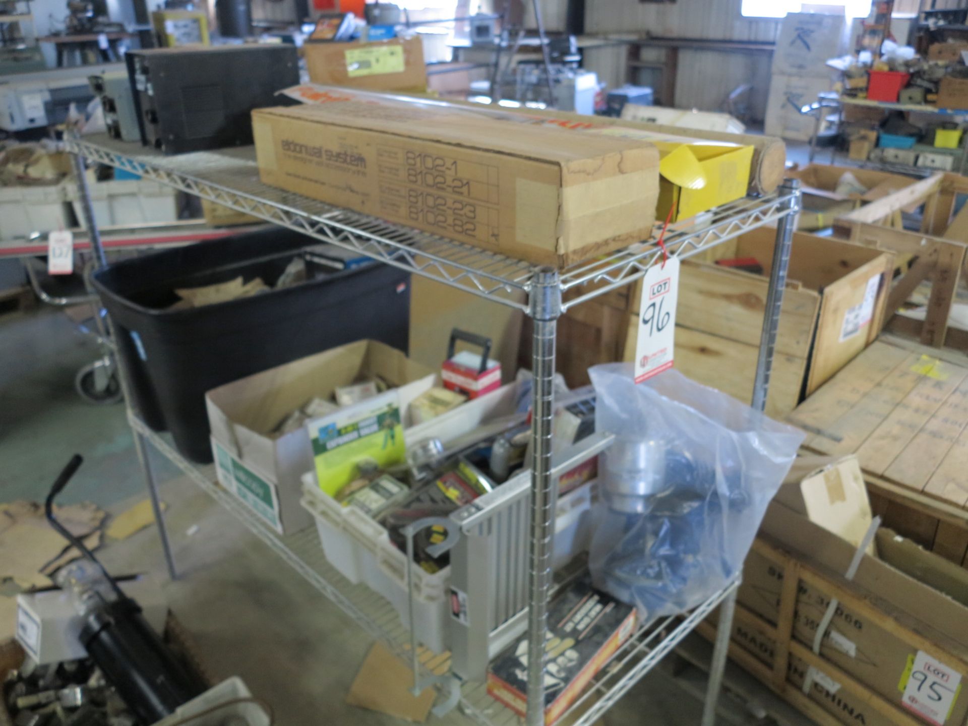 LOT - CONTENTS OF RACK: PAINT GUN, HOUSEHOLD ITEMS, TIE DOWNS, WELDING INVERTS