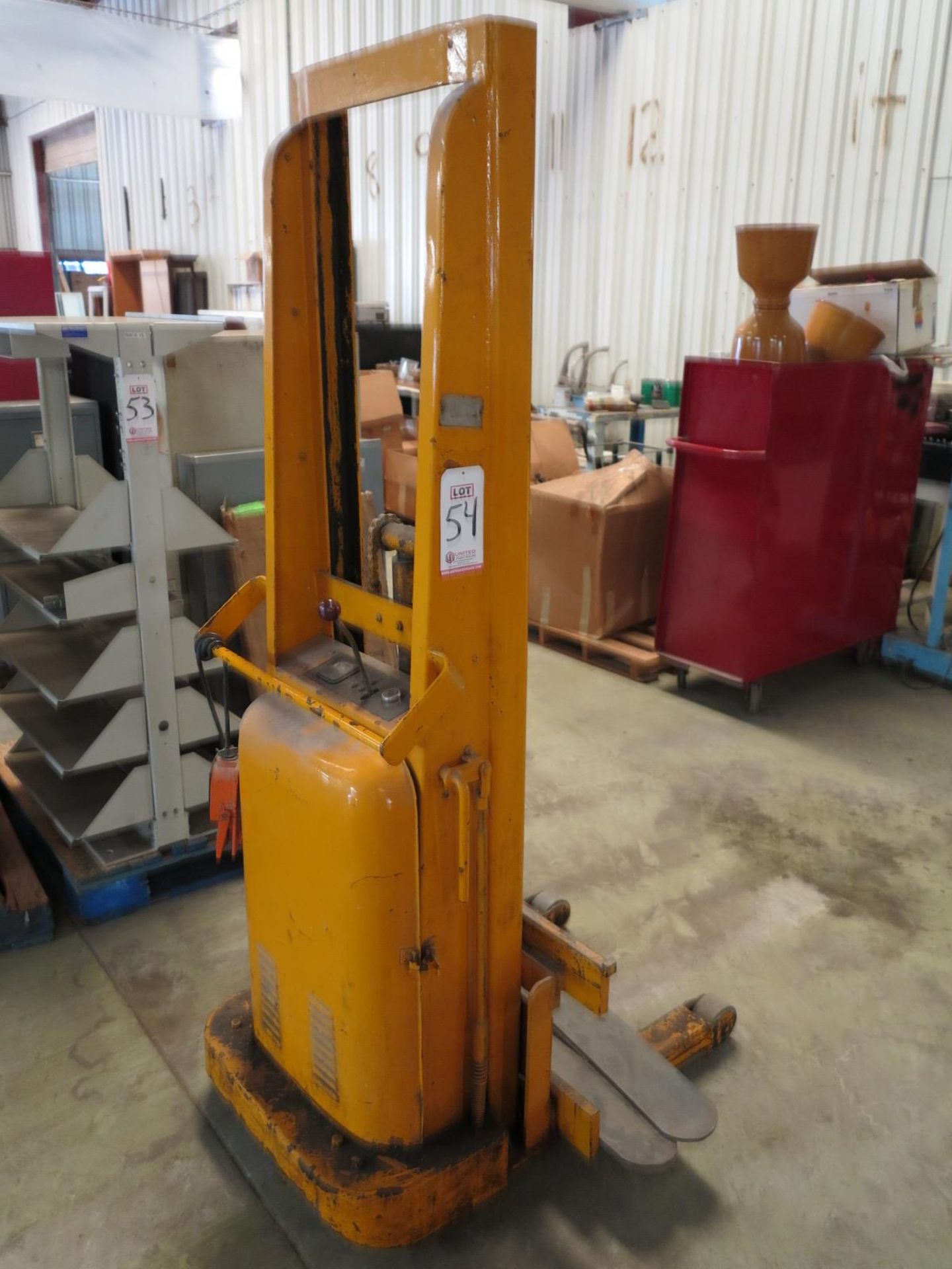 BIG JOE ELECTRIC LIFT W/ FORKS (NEEDS BATTERY)