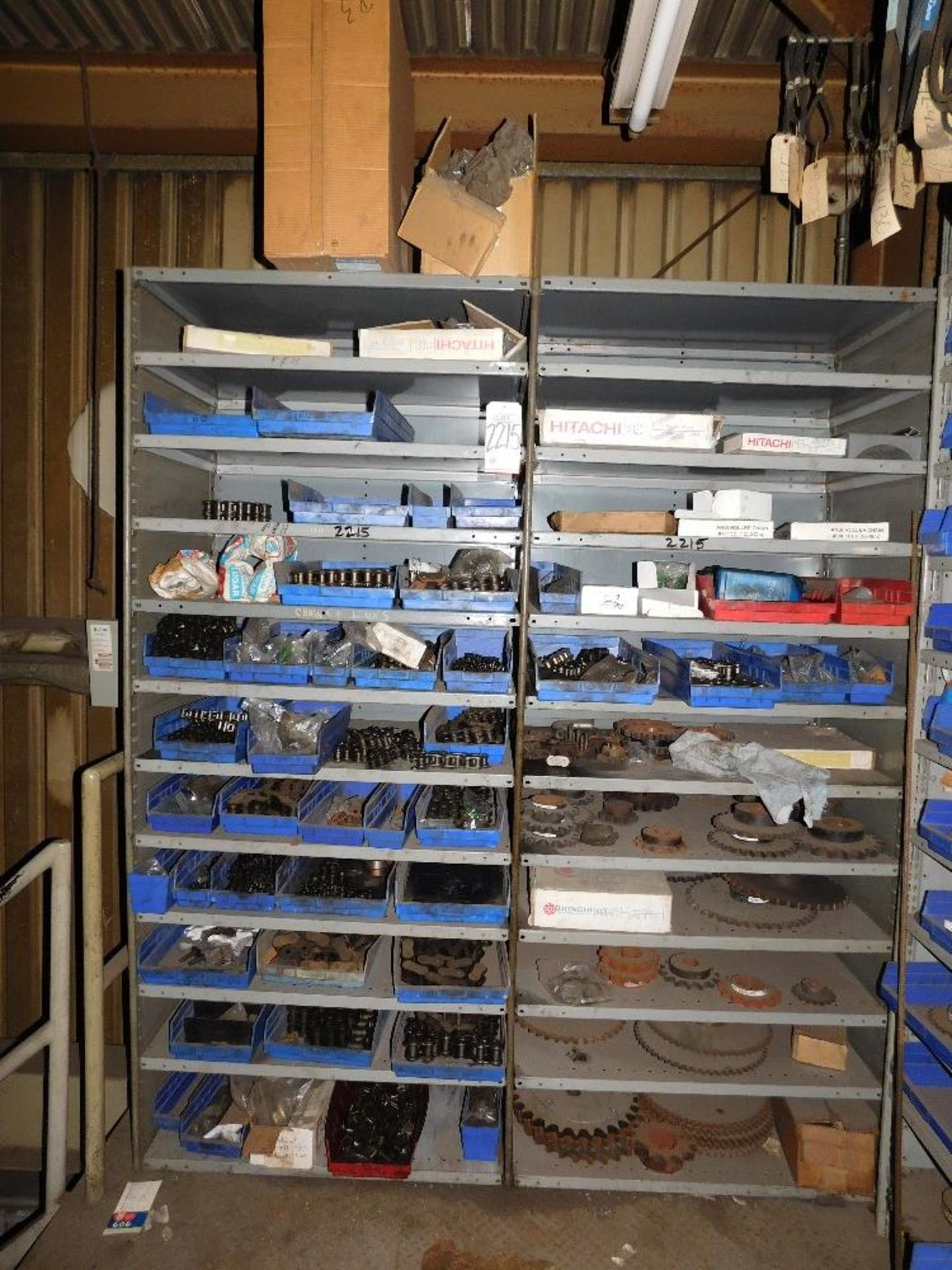 LOT - (2) 3' SHELF UNITS FULL OF STEEL SPROCKET CHAIN AND SPROCKETS, VARIOUS SIZES