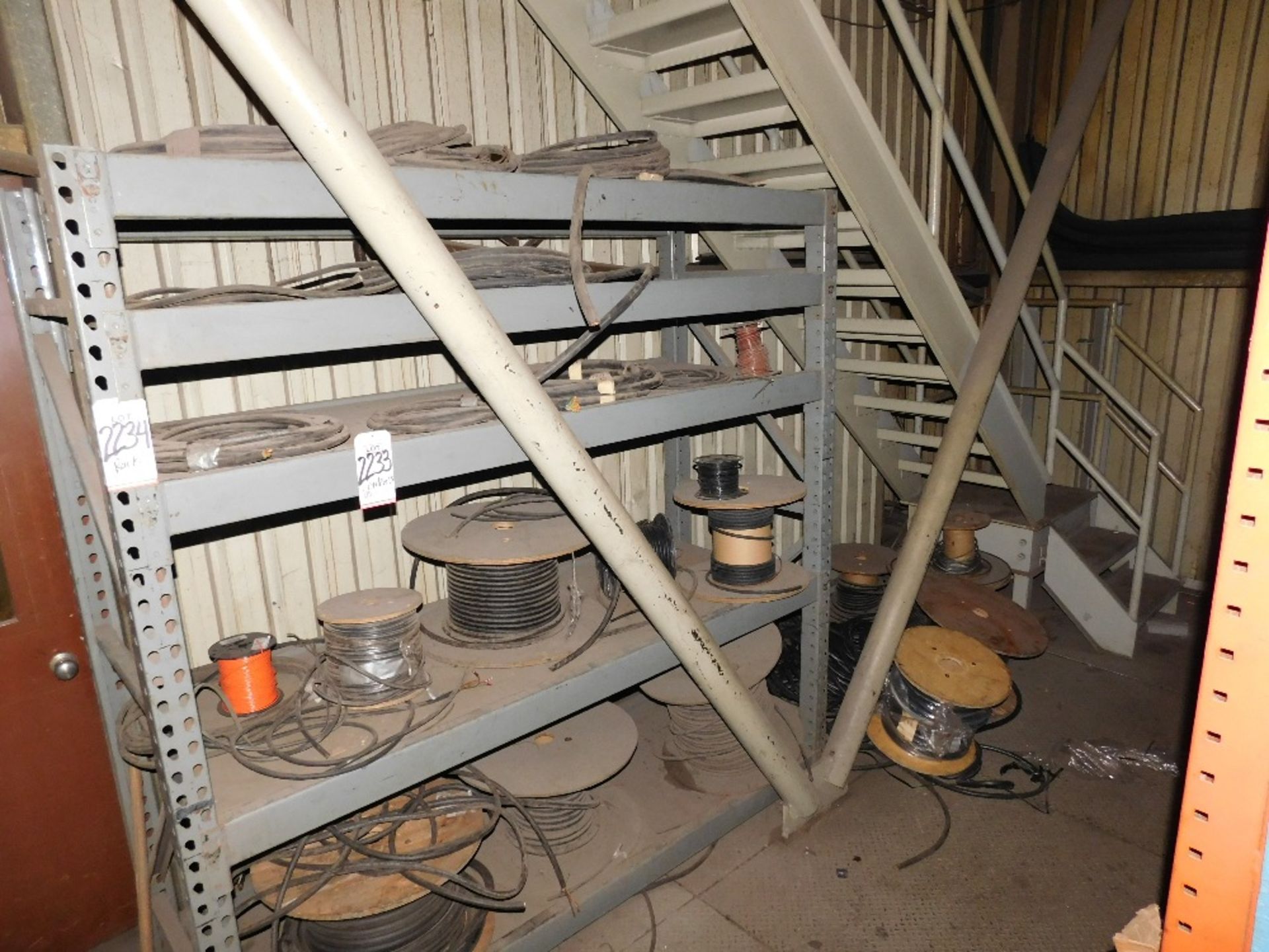 LOT - CONTENTS OF RACK ONLY: WIRE SPOOLS, PLUS SPOOLS ON FLOOR NEXT TO RACK (RACK NOT INCLUDED)
