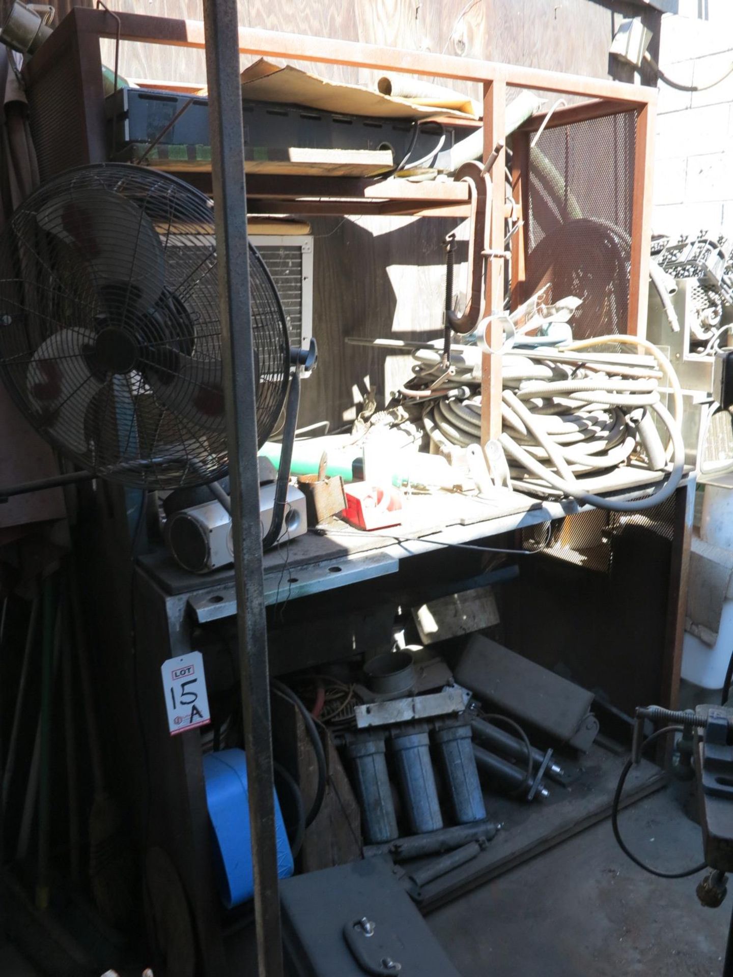 LOT - SHELF AND ITEMS IN CORNER: FAN, FILTERS, HOSE, PRESS FRAME, MOTORS, ETC.