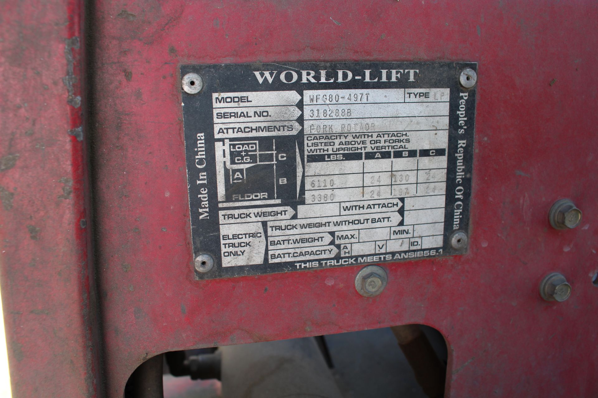 WORLD-LIFT FORKLIFT, MODEL WFG-497T, 6,000 LB CAP, 3-STAGE MAST, W/ FORK ROTATOR, S/N 318288B - Image 5 of 9