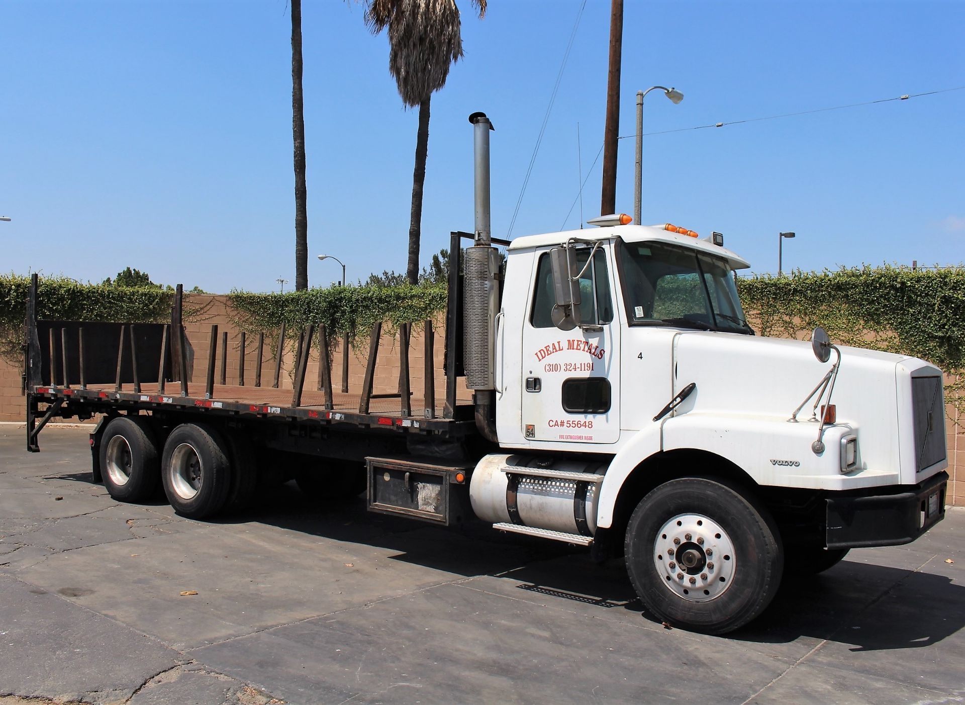 PHOTOS OF SKID STEER, STAKE BED TRUCK, FORKLIFTS, (186) METAL BINS AND SHOP EQUIPMENT - Image 2 of 37