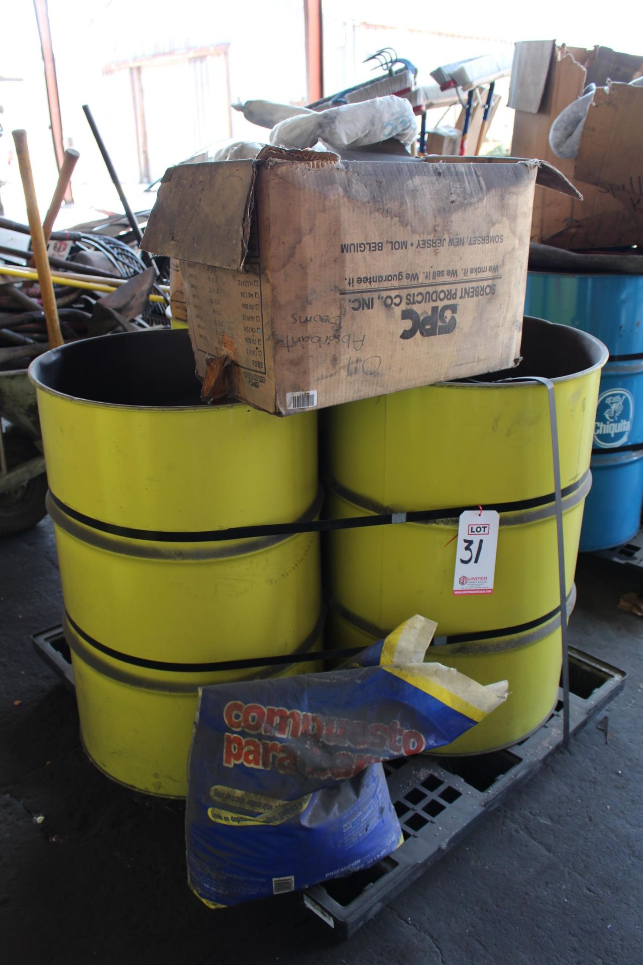 OIL ABSORBING MATERIAL IN BARRELS